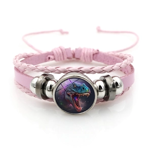 Pink multilayer leather bracelet featuring a glass T-Rex charm and adjustable cord