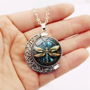 Double-sided rotating moon pendant necklace with dragonfly pattern and silver chain