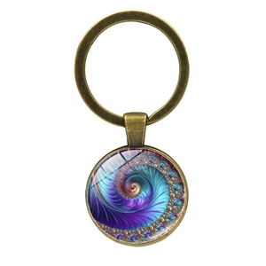 Fibonacci spiral keychain pendant with antique bronze finish and colorful glass fractal art