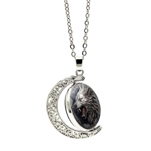 Rotating crescent moon pendant necklace featuring a fierce wolf head art glass cabochon
