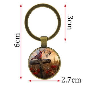 Bronze cardinal bird and cross keychain with Faith glass pendant in a 6cm size