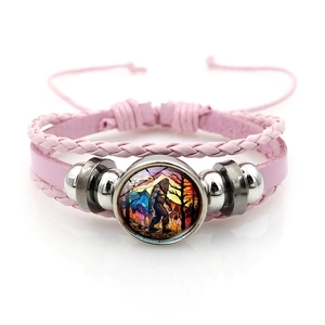 Pink multilayer braided leather bracelet featuring a glass Bigfoot sunset pendant charm