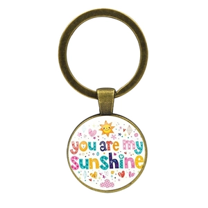 Porte-clés vintage en bronze You Are My Sunshine avec cabochon en verre et motifs soleil