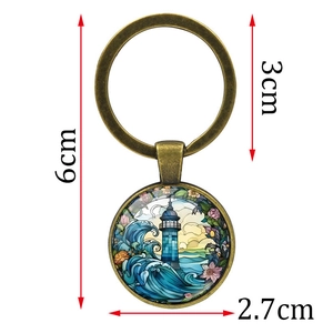 Lighthouse and wave art glass pendant keychain in bronze finish with size measurements