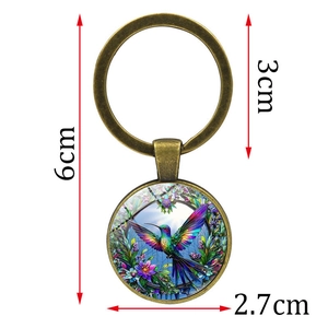 Colorful hummingbird glass cabochon keychain in bronze finish with size specifications