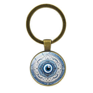 Porte-clés œil grec vintage en bronze avec cabochon en verre mandala bleu et métal