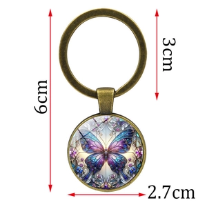 Vintage bronze butterfly glass cabochon keychain pendant measuring 6cm in total length