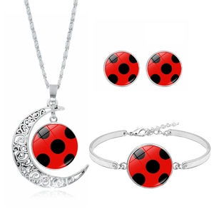Polka dot jewelry set with moon pendant necklace, bracelet and earrings in silver finish
