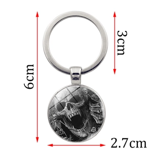 Porte-clés gothique punk squelette mesurant 6cm de long et 3cm de diamètre de bague