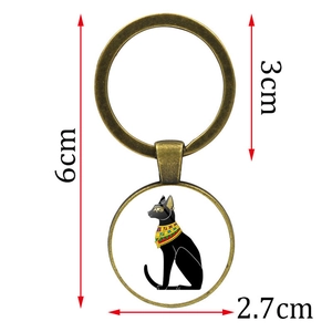 Vintage bronze keychain with Egyptian cat goddess Bastet pendant in a glass cabochon
