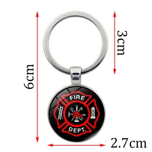 Fire Dept keychain with red and black Maltese cross logo under glass dome pendant