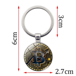 Portachiavi Bitcoin dorato con motivo a circuito e freccia nera, totale 6cm