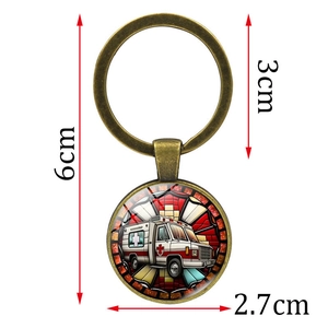 Vintage bronze ambulance keychain with glass dome pendant and precise dimensions shown