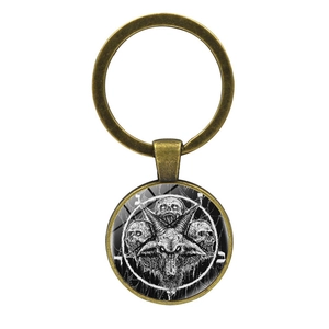 Vintage bronze Baphomet key ring featuring a black and white goat head skull and pentagram