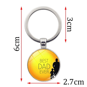 Detail showing Best Dad Ever keychain with dimensions 6cm length and 2.7cm pendant diameter