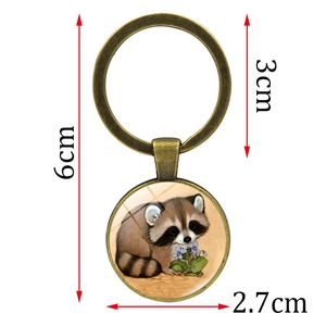 Vintage bronze raccoon keychain with dimensions 6cm length and 3cm ring diameter