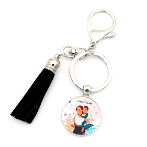 Detailed macro of I Love You Mom keychain with a black tassel and lobster clasp