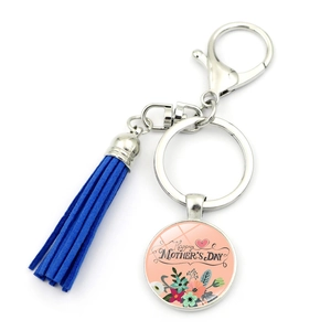 Detail of Mother's Day keychain with blue tassel and Happy Mother's Day floral charm