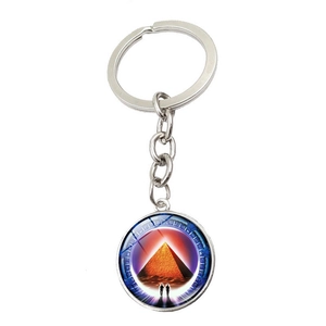Silver Stargate Atlantis keychain pendant with movie-themed glass gem and pyramid design