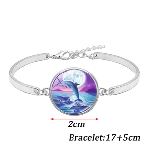 Silver dolphin necklace and bracelet jewelry set with moonlit ocean glass cabochon