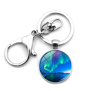 Detailed view of Aurora Borealis glass pendant with metal lobster clasp and key ring
