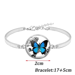 Vintage silver bracelet with blue butterfly glass gem charm and adjustable chain link