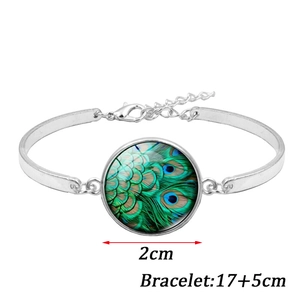 Silver bracelet with peacock feather glass gem and adjustable chain of 17+5cm