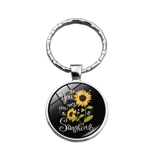Porte-clés dôme en verre tournesol avec texte You are my Sunshine et cadre argenté