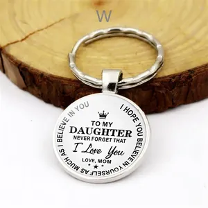 Polished silver keychain for daughter with crown design and inspirational quote