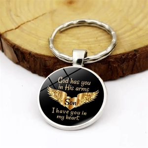 Memorial heart and angel wings keychain for son in polished silver metal frame