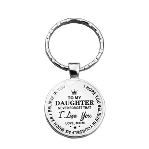 To My Daughter inspirational quote silver metal keychain with crown charm on white background