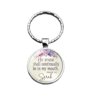 Custom silver keychain with purple rose pattern and biblical quotes on white background