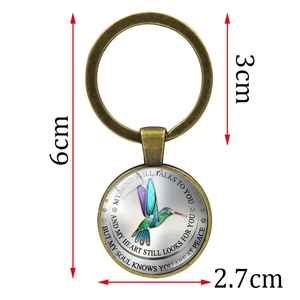 Vintage bronze hummingbird keychain with My Mind Still Talks To You glass pendant