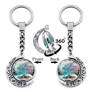 Vintage Zinc Alloy Tree Of Life Moon Rotating Keychain Double Sided Hollow Out Metal Key Ring For Bag Decor Creative Gift