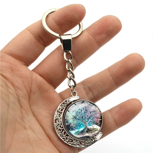 Rotating crescent moon keychain with double-sided tree of life glass pendant ornament