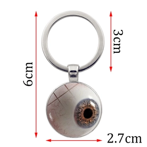 Porte-clés œil réaliste en verre avec anneau en métal argenté et détails de l'iris