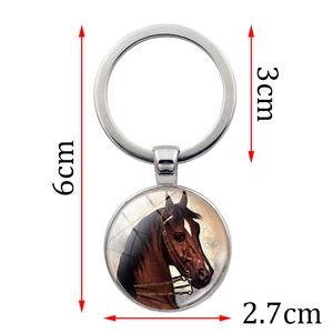 Detailed view of horse head glass dome keychain with 6cm total length and 3cm ring size