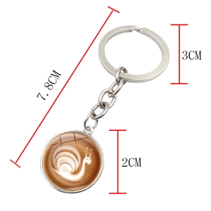 Detailed view of coffee latte art keychain with precise 7.8cm dimensions on white background