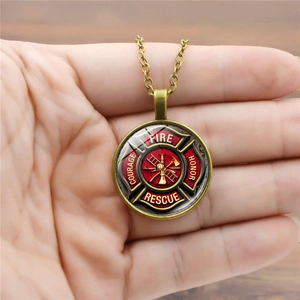 Antique bronze firefighter rescue pendant necklace featuring Maltese cross emblem