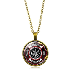 Detailed macro of a bronze firefighter badge pendant with proud to be firefighter text