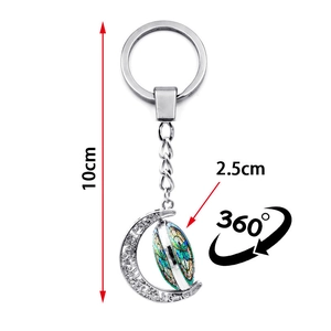 Silver crescent moon keychain with rotating colorful butterfly pendant and 10cm total length