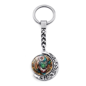 Bohemian owl rotating moon pendant keychain with silver metallic finish and glass gem detail