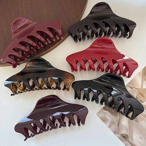 Set of 6 large high-gloss hair claw clips in black, tortoiseshell, and red colors