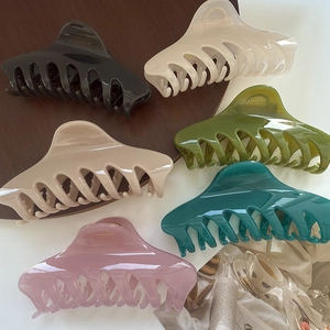 Set of 6 colorful resin hair claws with marble finish for women's hairstyling