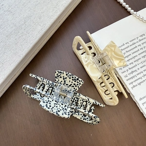 Elegant acetate hollow rectangle hair claws in marble and spotted patterns
