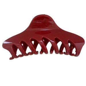 Deep red large shark hair claw clip in minimalist keel design for elegant women's updo