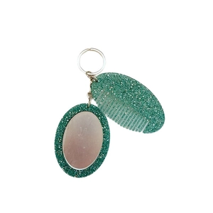 Glittery green portable oval comb and mirror keychain set with silver metallic ring