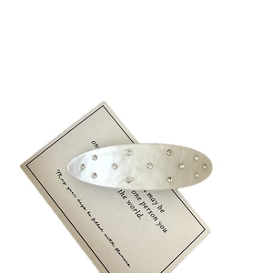 Oval moonstone white acetate hair clip with sparkling rhinestones for women