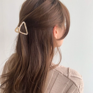 Elegant triangular acetate hair claw clip with marble texture for women styling