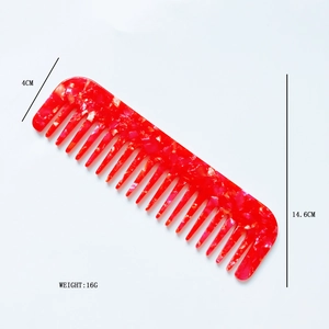 Detail view of marble pattern wide-tooth acetate comb with dimensions 14.6cm by 4cm